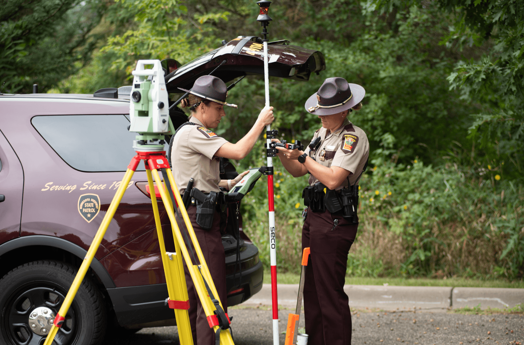 Troopers putting together crash reconstruction tools