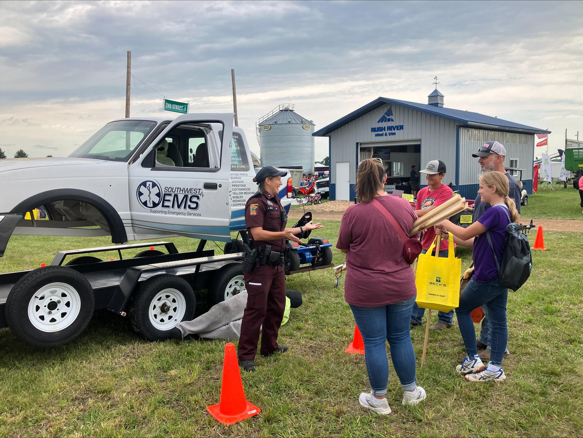 commercial vehicle inspector talking to a group of people